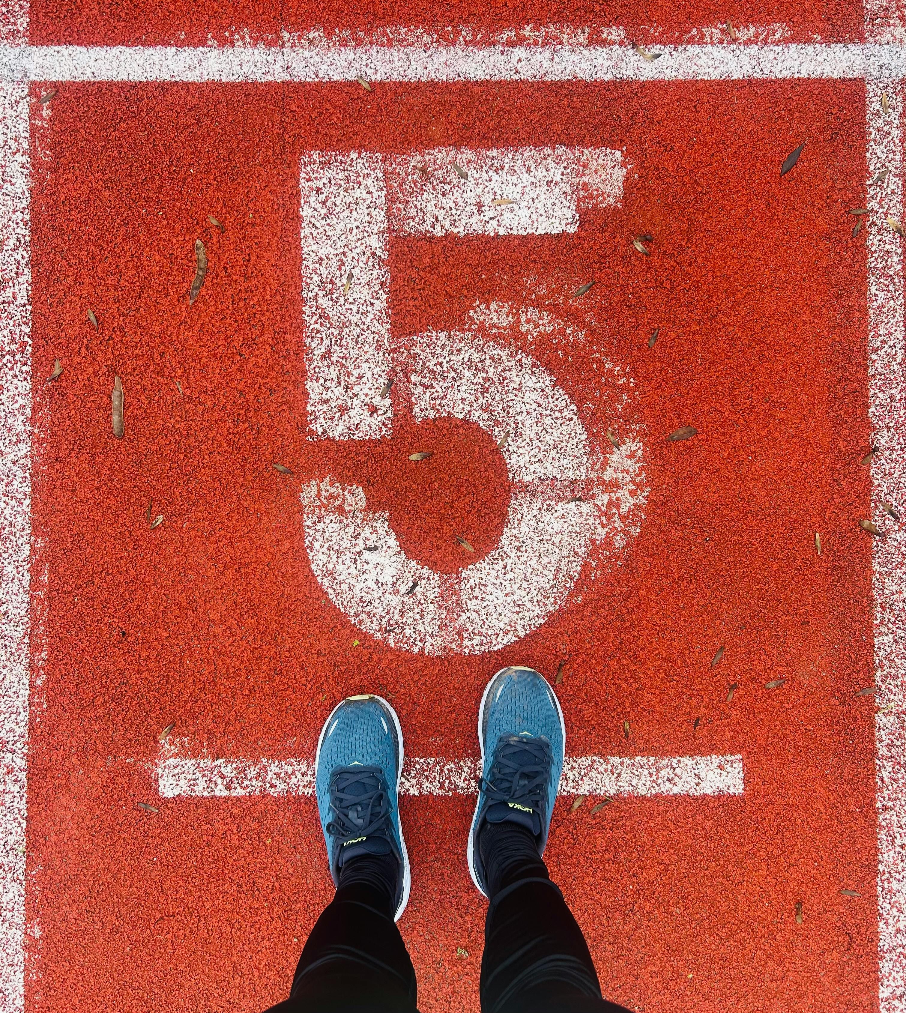 Beginner runner on a track taking their first steps